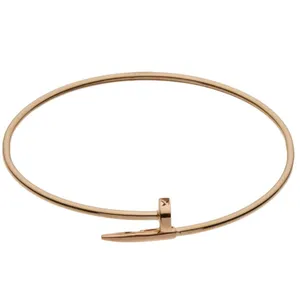 دستبند طلا کم اجرت 18 عیار زنانه طلا و شمش برلیان مدل میخ