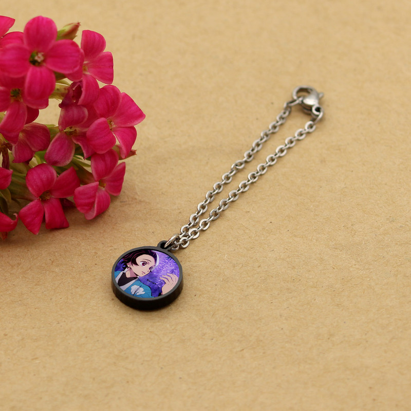 آویز ساعت زنانه ناکسیگو مدل شب تاب طرح Demon Slayer کد AW9032