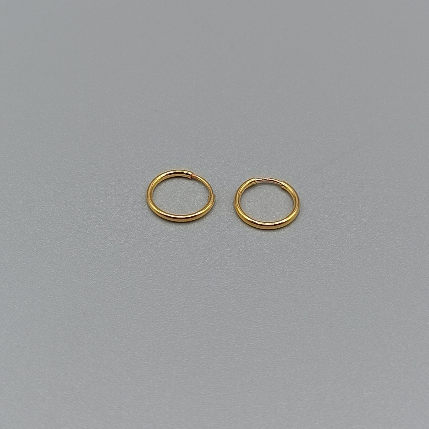 گوشواره طلا 18 عیار زنانه مدل حلقه ای