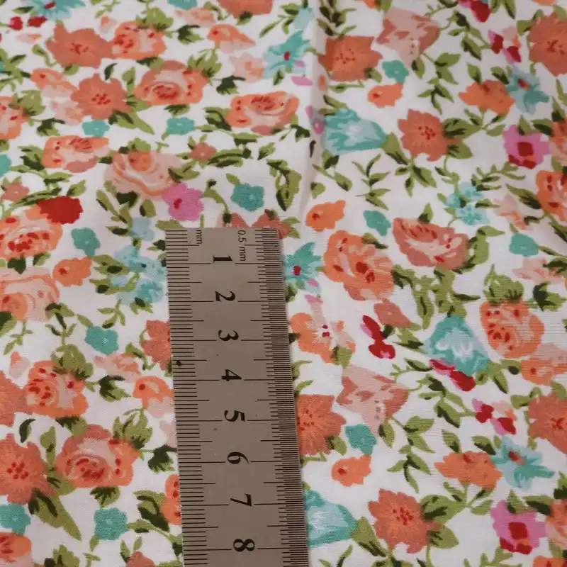 پارچه لباس مدل کودری نخی طرح گلریزان کد MC