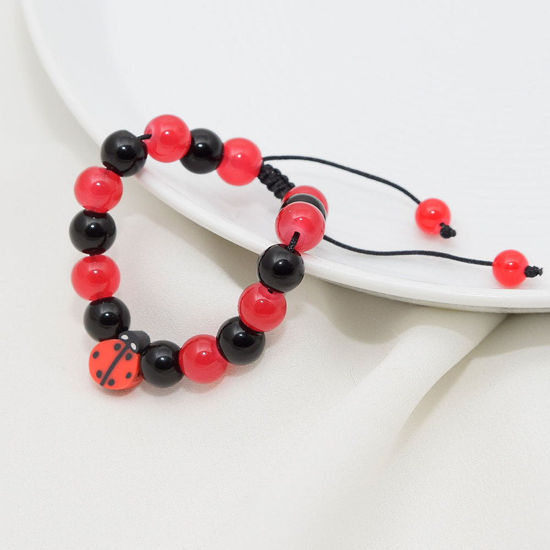 دستبند دخترانه دلنار گالری مدل کفشدوزک