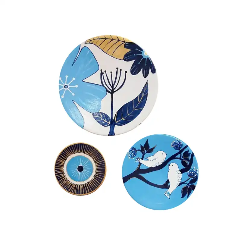 بشقاب دیوارکوب سفالی طرح گل و پرنده مجموعه سه عددی