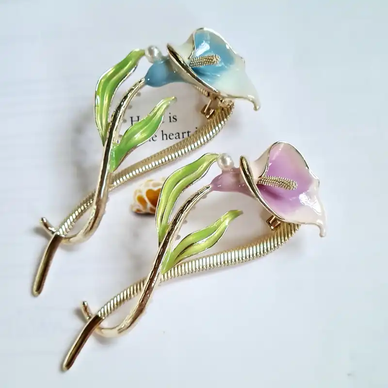 گیره مو زنانه مدل گل شیپوری چفتی کد fengy 222