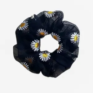 کش مو زنانه مدل بابونه گل های ابریشم