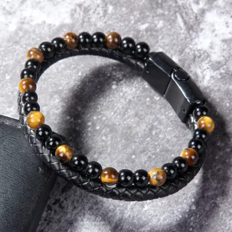 دستبند مردانه مدل چرمی چشم ببر کد 3066