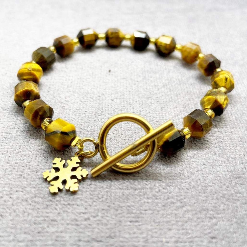 دستبند زنانه مدل چشم ببر با قفل تی