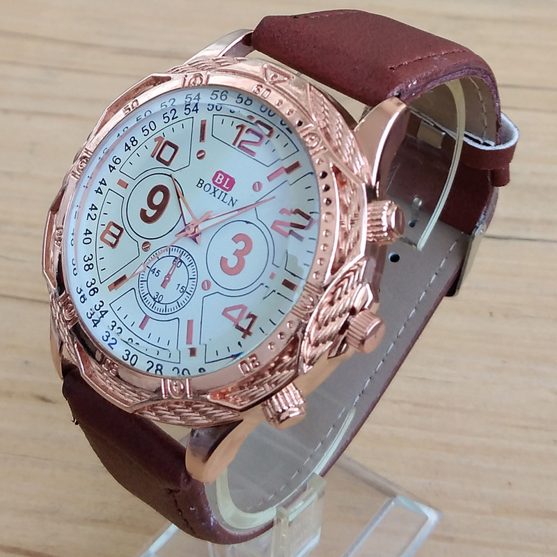 ساعت مچی عقربه ای پسرانه مدل بند چرمی کد BL54-67 ساعت مچی عقربه ای پسرانه مدل بند چرمی کد BL54-67