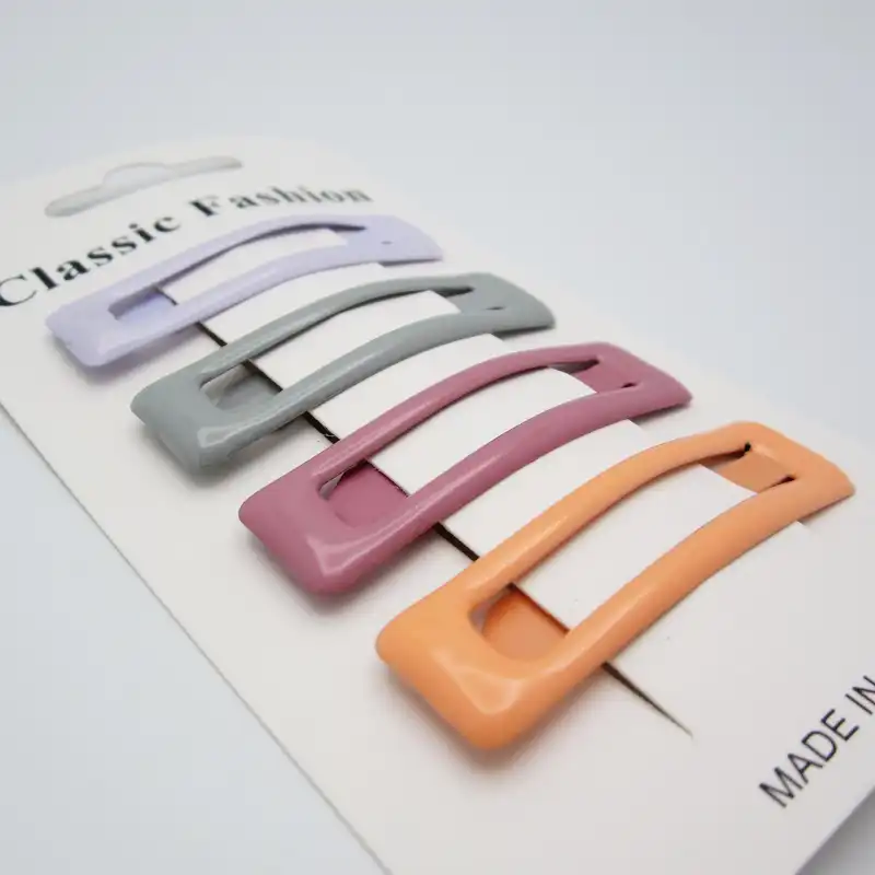 گیره مو زنانه مدل تق تقی لاکی کد 2 بسته 4 عددی