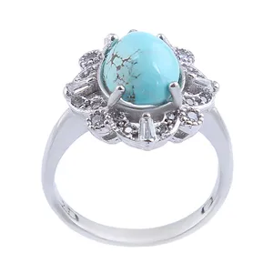 انگشتر نقره زنانه مدل بازرگانی میلادی فیروزه طبیعی نیشابور روکش رادیوم کد AWR_1233