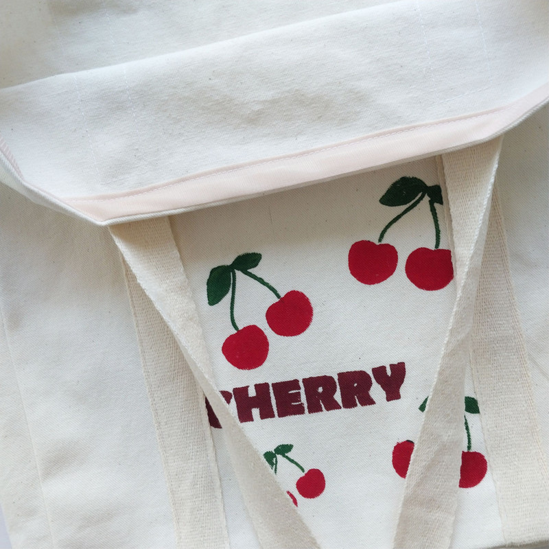 ساک دستی مدل جیب دار طرح گیلاس