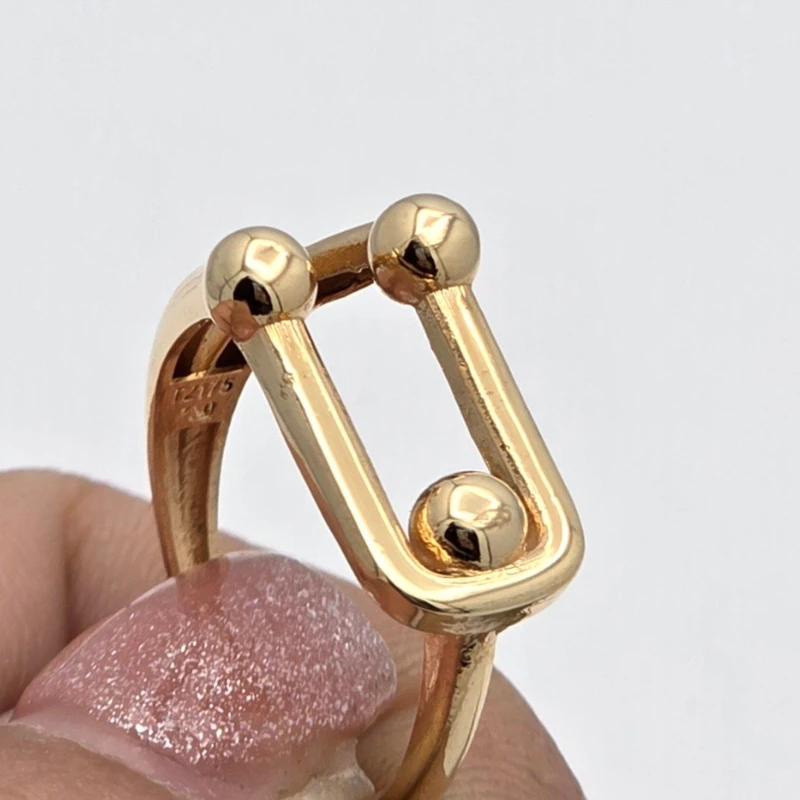 عکس شماره 3 : انگشتر طلا کم اجرت 18 عیار زنانه با طرح تیفانی طلا و شمش برلیان کد 5 سایز 57