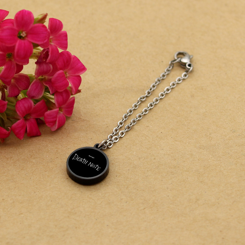 آویز ساعت زنانه ناکسیگو مدل شب تاب طرح Death Note کد AW7208