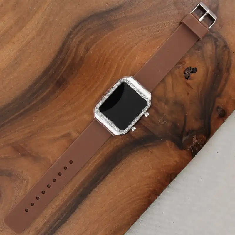 ساعت مچی دیجیتال زنانه مدل  بند سیلیکونی نگین دار کد WHW_287