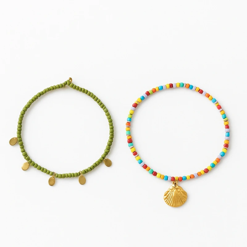 دستبند مهره ای زنانه مدل کشی صدفی سکه ای مجموعه ۲ عددی