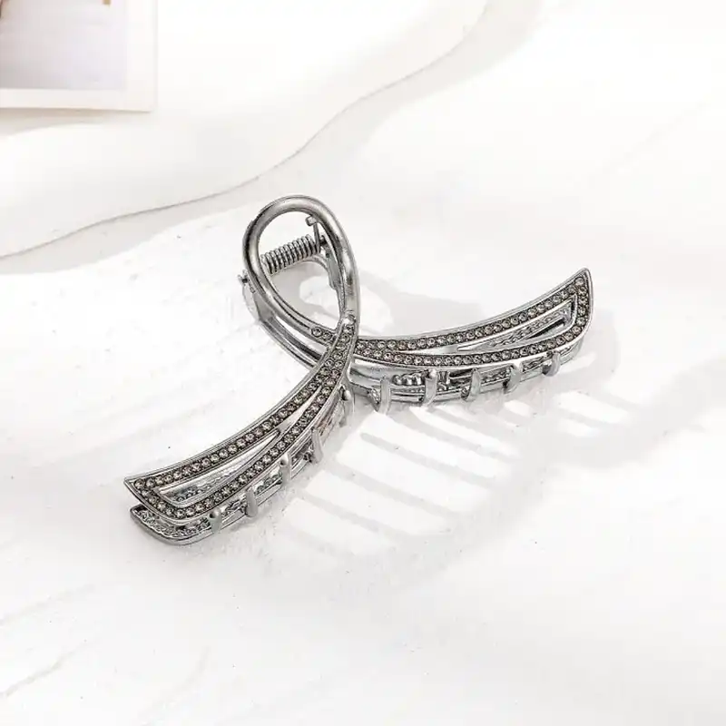 کلیپس مو زنانه مدل فلزی نگین‌دار هشتی کد brg 390