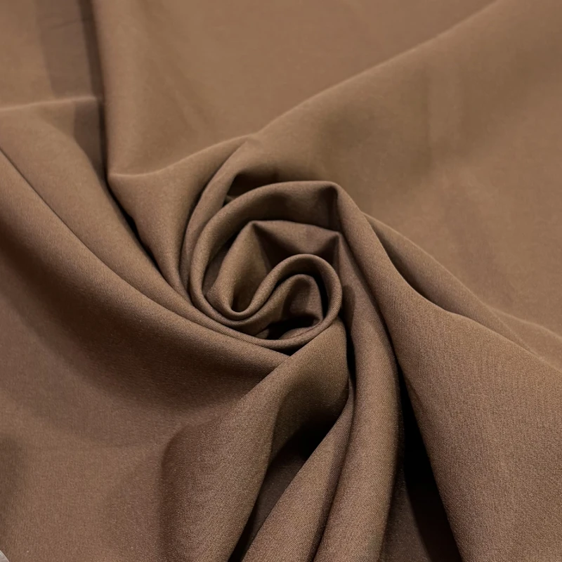 پارچه لباس عرض 1.5 متر مدل والا طرح کرپ رنگ قهوه‌ای روشن