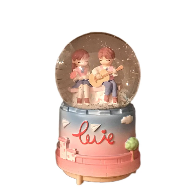 گوی موزیکال مدل پمپی طرح دختر و پسر ویولون زن عروسک چرخان 