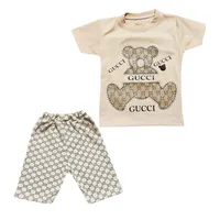 ست تی‌شرت آستین کوتاه و شلوارک راحتی بچگانه مدل نخی طرح تدی 