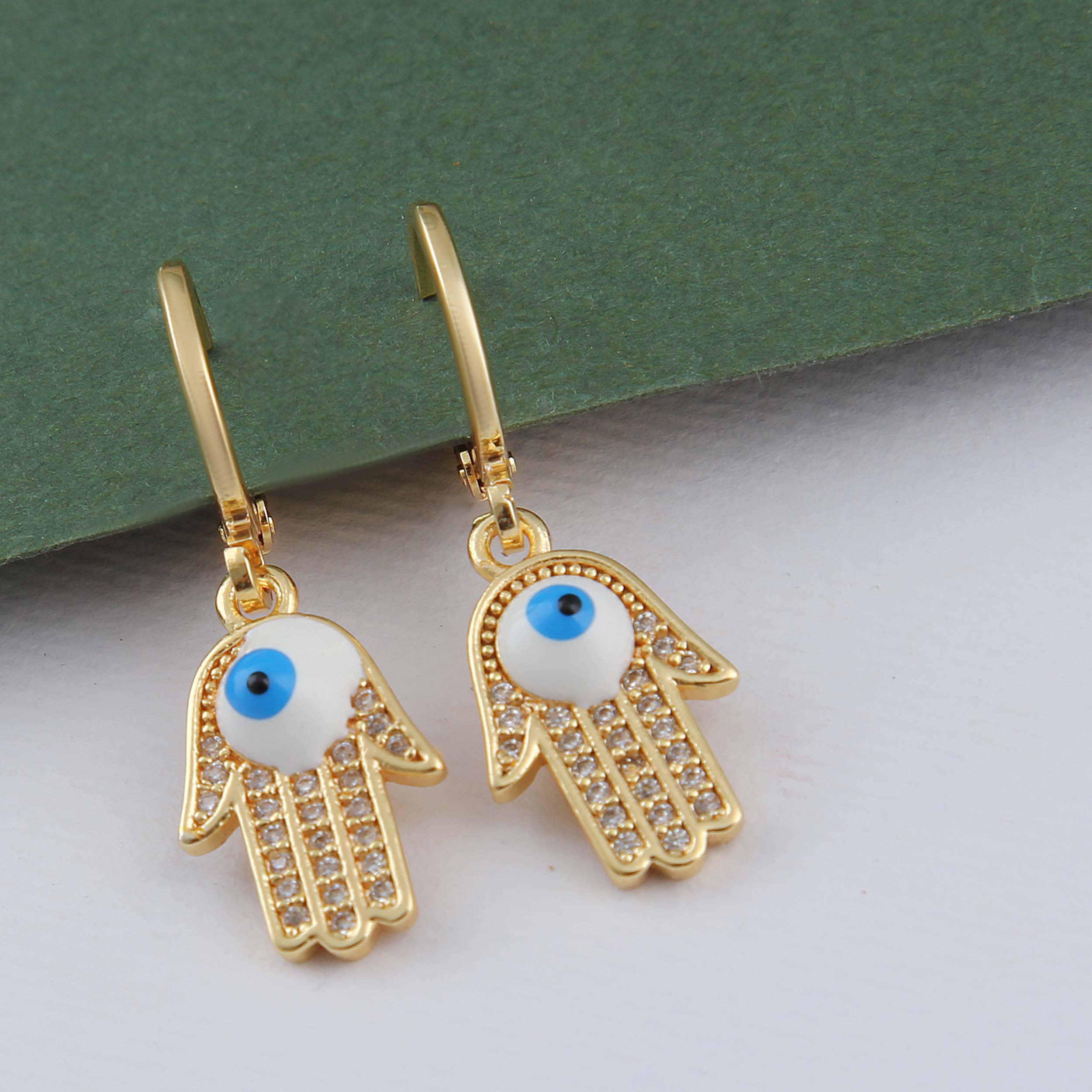 گوشواره زنانه بازرگانی میلادی مدل چشمو نظر مدرن کد GZN_336 گوشواره زنانه بازرگانی میلادی مدل چشمو نظر مدرن کد GZN_336