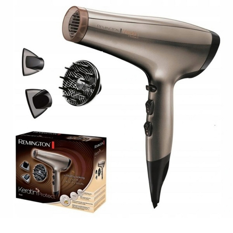 سشوار رمینگتون مدل AC8002 Keratin Protect با موتور AC، توان 2200 وات، فناوری تولید یون، محافظت از کراتین مو، تنظیم دما در 3 حالت، تنظیم سرعت در 2 حالت، باد سرد، کابل 1.8 متری، همراه با 3 سری مختلف، مناسب استفاده خانگی و نیمه‌حرفه‌ای