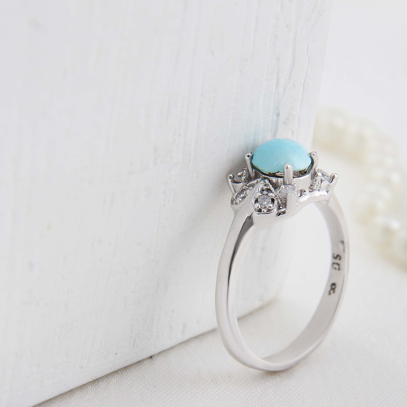 انگشتر نقره زنانه بازرگانی میلادی مدل فیروزه طبیعی نیشابور قالب جواهری روکش رادیوم کد AWR_1637 انگشتر نقره زنانه بازرگانی میلادی مدل فیروزه طبیعی نیشابور قالب جواهری روکش رادیوم کد AWR_1637