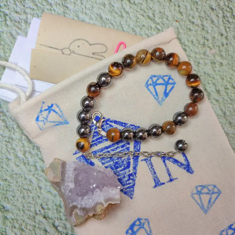 دستبند زنانه مدل چشم ببر و حدید طبیعی 911