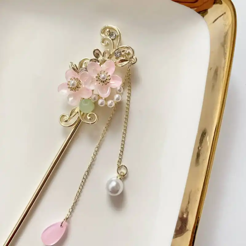 گیره مو زنانه مدل کانزاشی طرح گل تاج دار