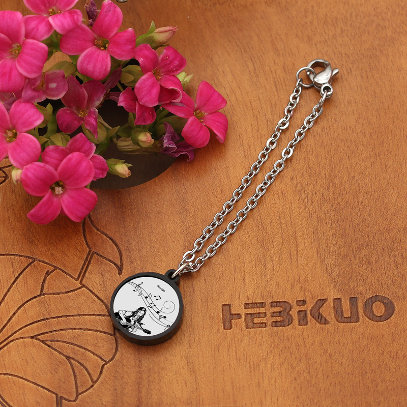 آویز ساعت زنانه ناکسیگو مدل شب تاب طرح موسیقی کد AW8831