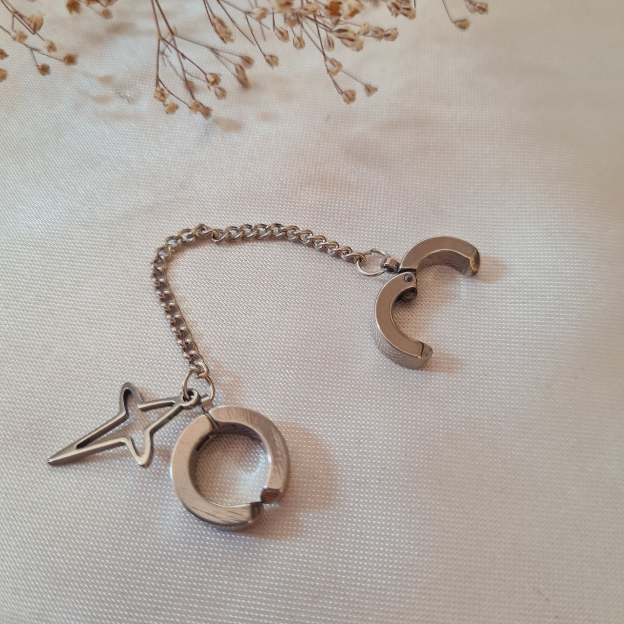 پیرسینگ گوش مدل ستاره زنجیری