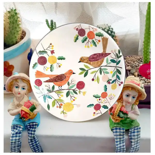 بشقاب دیوارکوب سفالی طرح گل و بلبل مجموعه 4 عددی