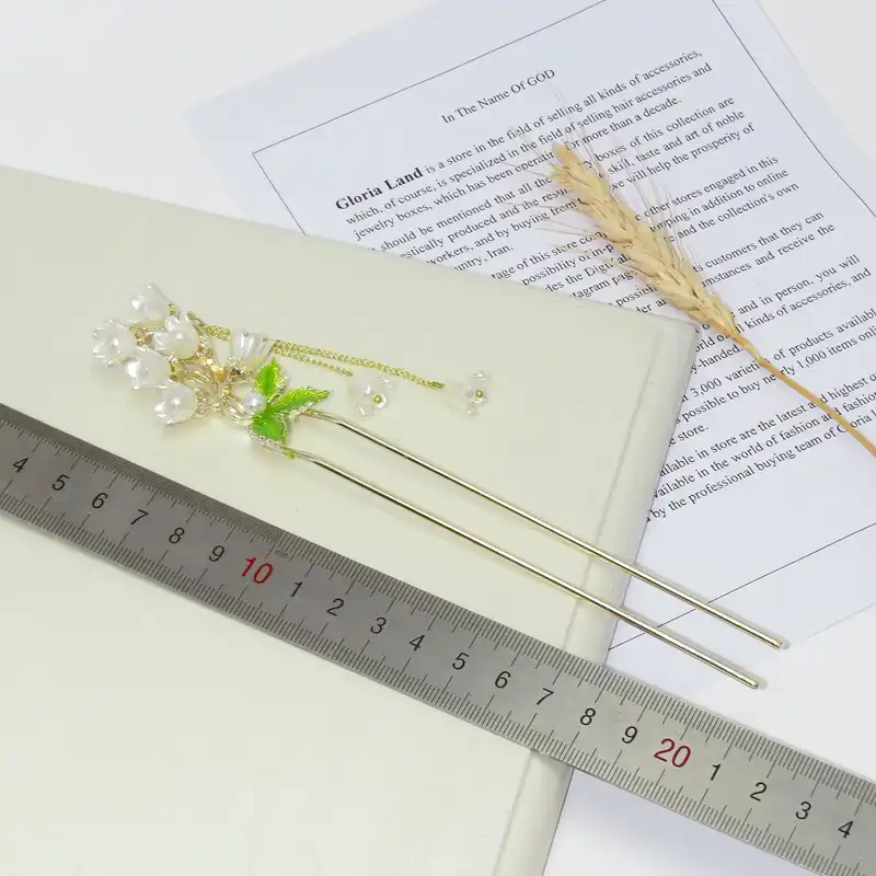 گیره مو زنانه مدل کانزاشی آویز دار شکوفه کد G_Lnd_3153