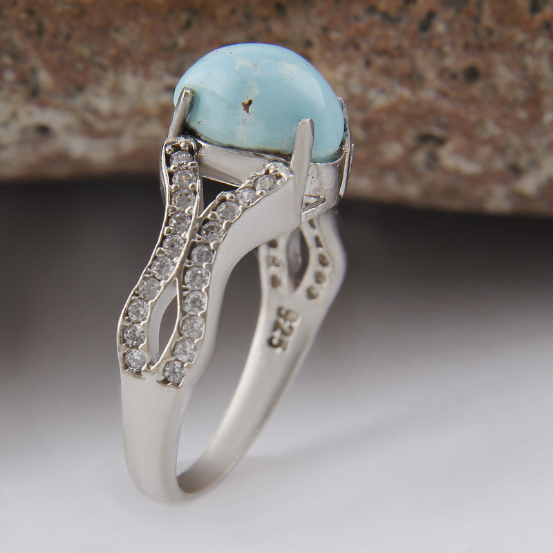 انگشتر نقره زنانه بازرگانی میلادی مدل سنگ فیروزه طبیعی نگین برلیان بدون ریزش آبکاری رادیوم کد AWR_1597