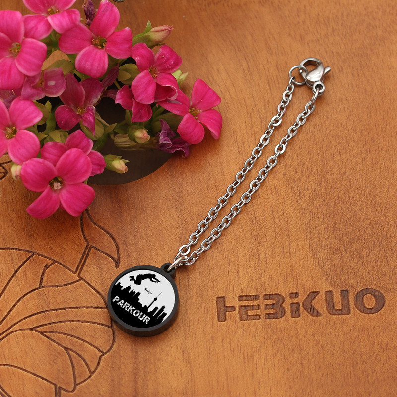 آویز ساعت زنانه ناکسیگو مدل شب تاب طرح پارکور کد AW8961