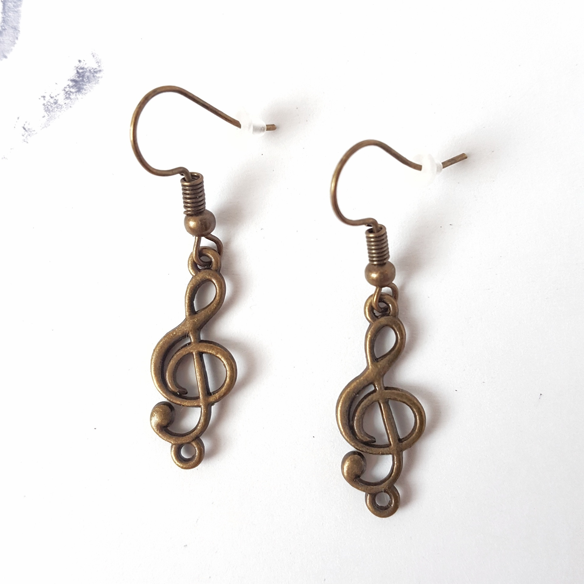 گوشواره دخترانه نمدیکا طرح کلید سل گوشواره دخترانه نمدیکا طرح کلید سل