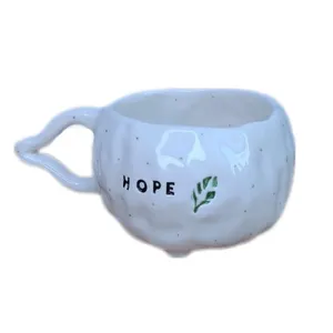 ماگ سرامیکی طرح دفرمه مدل HOPE
