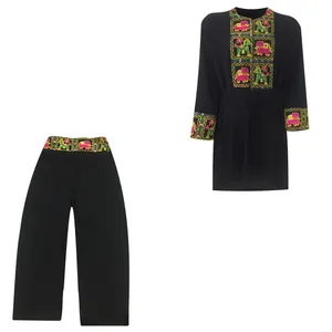 مانتو و شلوار زنانه مدل نخی ابر و بادی خامه دوزی کد tm-2715