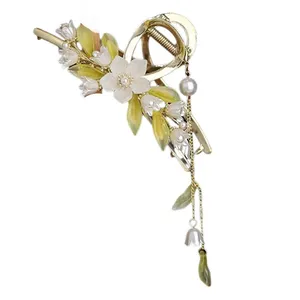 کلیپس مو زنانه مدل فلزی خوشه لاله