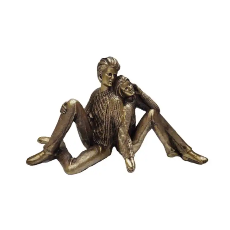 مجسمه دنیا دکوری سرمد مدل دختر و پسر نشسته کد 02