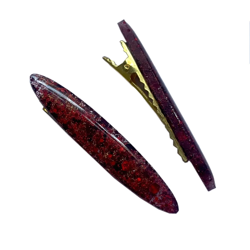 گیره مو زنانه مدل رزینی طرح اکلیلی بسته 2 عددی