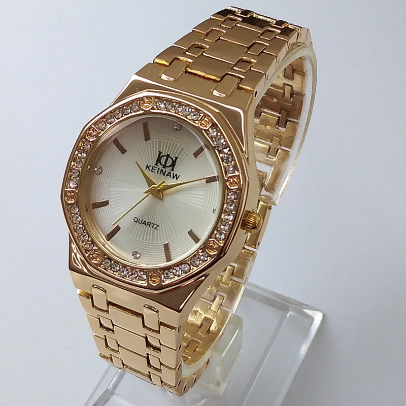 ساعت مچی عقربه ای زنانه مدل بندفلزی نگین دار کد 02 ساعت مچی عقربه ای زنانه مدل بندفلزی نگین دار کد 02