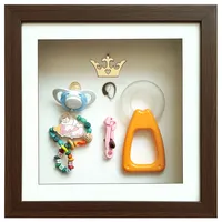 قاب عکس کودک مدل&nbsp;تندیس دست و پا و یادگاری های نوزادی کد BR-2t