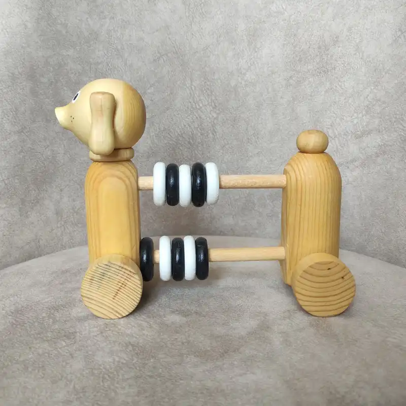 اسباب بازی چوبی مدل سگ شکم حلقه کد 011