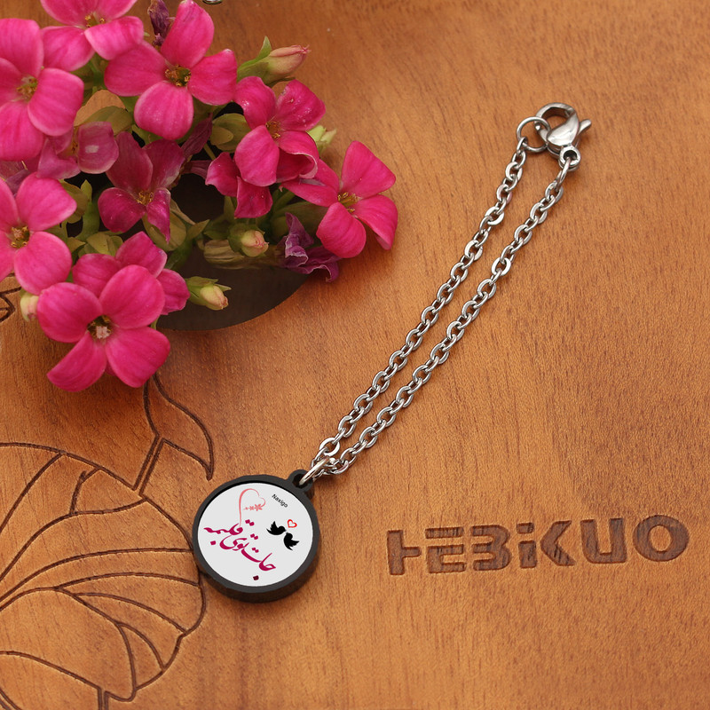 آویز ساعت زنانه ناکسیگو مدل شب تاب طرح جات توی قلبمه کد AW8801