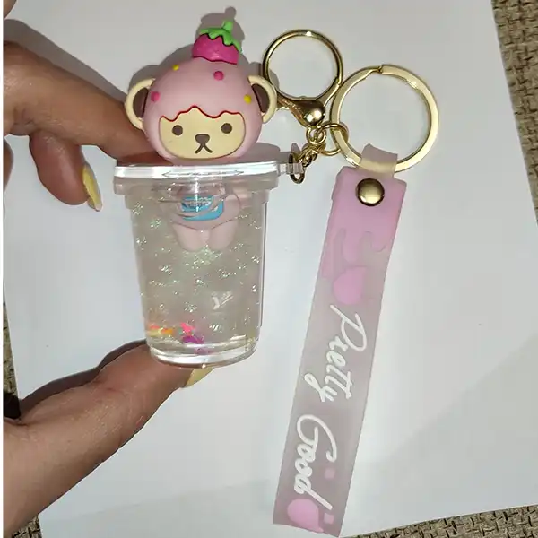 جاکلیدی زنانه مدل لیوانی آکواریومی طرح گربه سفید پوش 02