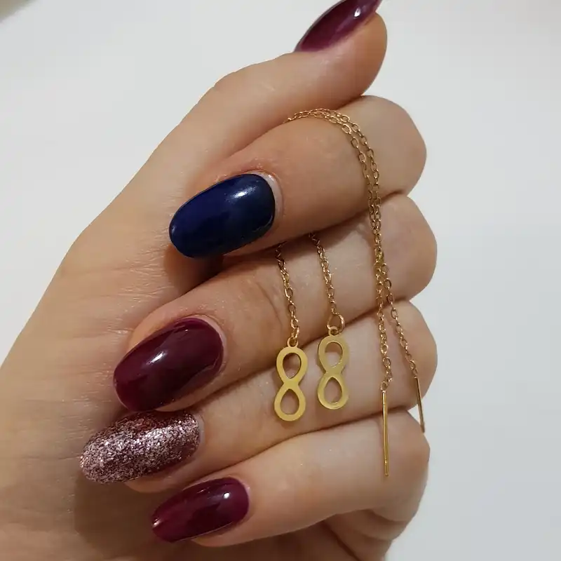 گوشواره زنانه مدل بخیه ای بینهایت 3412