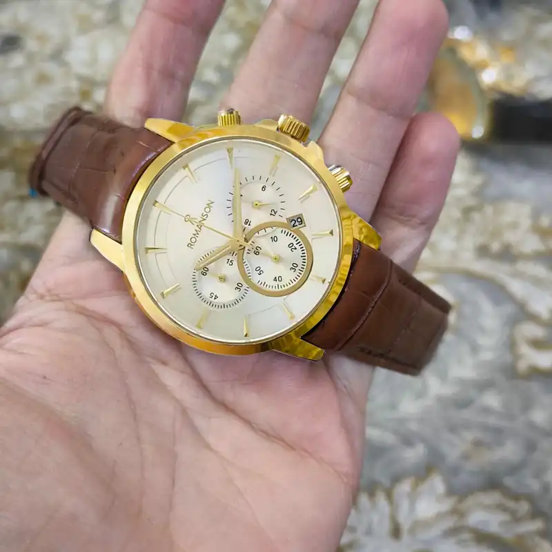 ست ساعت مچی عقربه ای زنانه و مردانه رومانسون مدل تک موتوره بند چرم صفحه طرح دار کد 1