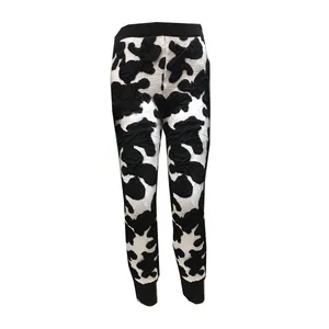 لگینگ زنانه مدل بافت برجسته گرم طرح گاوی