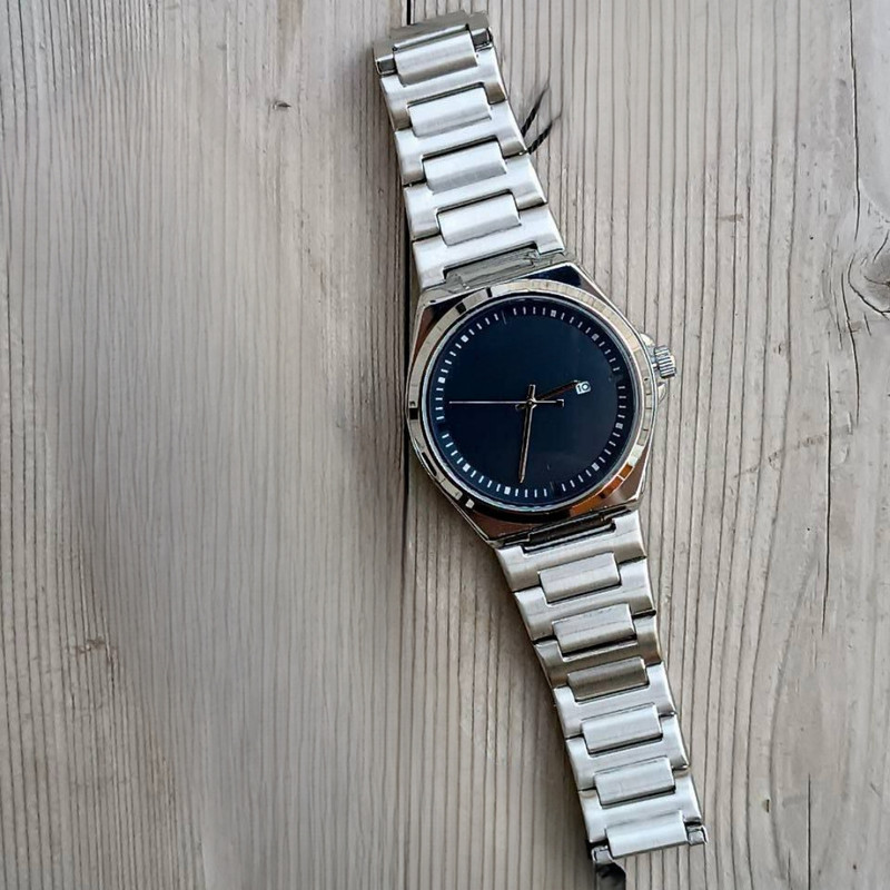 ساعت مچی عقربه‌ای مردانه کوارتز مدل کلاسیک بند استیل کد 04