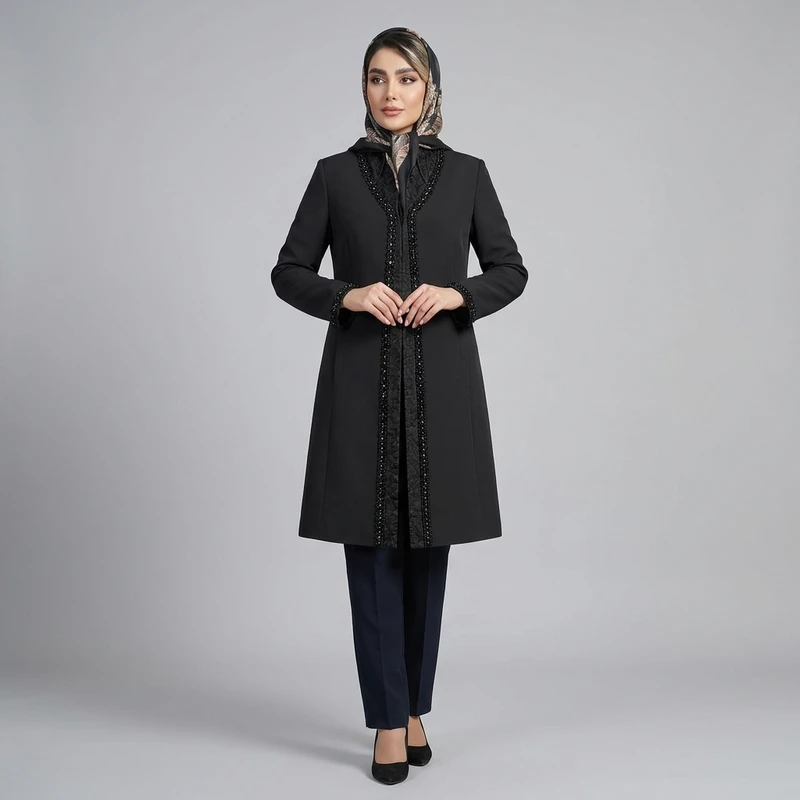 مانتو زنانه بلند پارچه کرپ با دکمه مخفی مدل Doreris