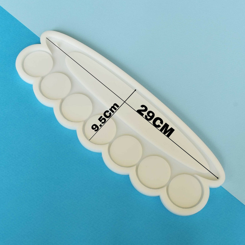 قالب رزین مدل جاعودی و شمع وارمری طرح بیضی لبه دار